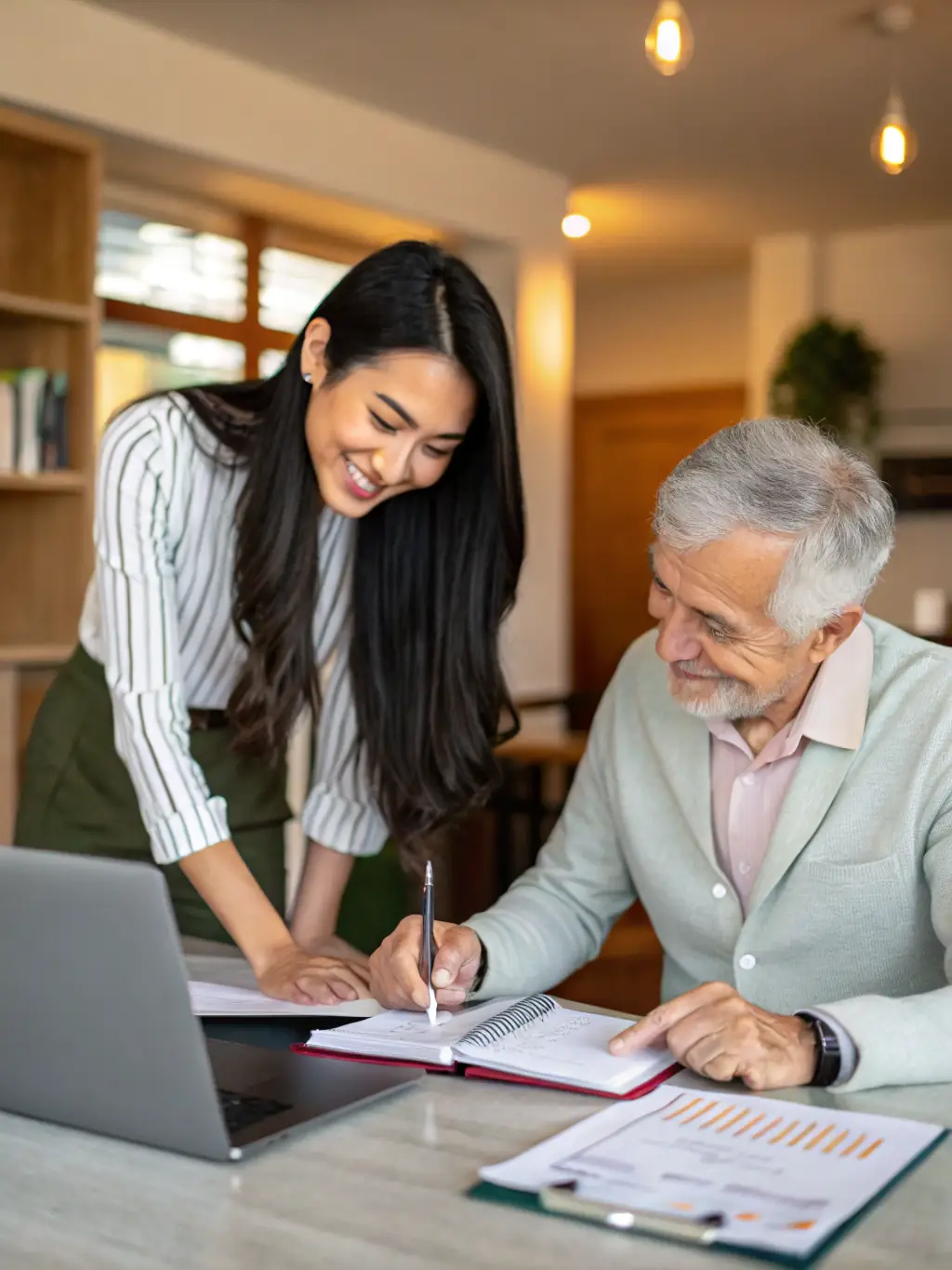 A friendly UnitedStreet bookkeeper assisting a small business owner with their financial documents, showcasing personalized support.